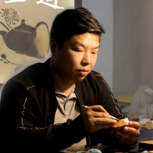 靳明